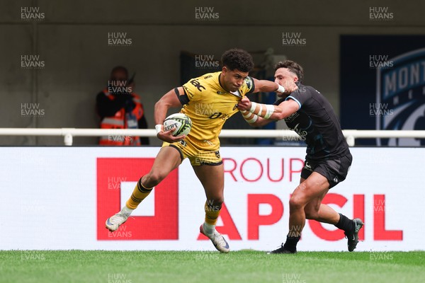 030526 - Montpellier Herault Rugby v Dragons RFC - EPCR Challenge Cup Semi Final - Rio Dyer of Dragons is tackled by Tom Banks of Montpellier 