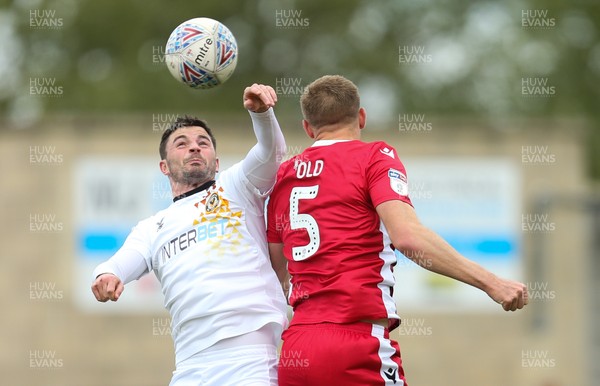 040519 - Morecambe v Newport County, Sky Bet League 2 - Padraig Amond of Newport County and Steven Old of Morecambe compete for the ball