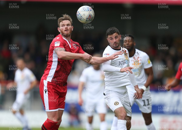 040519 - Morecambe v Newport County, Sky Bet League 2 - Padraig Amond of Newport County and Ritchie Sutton of Morecambe compete for the ball