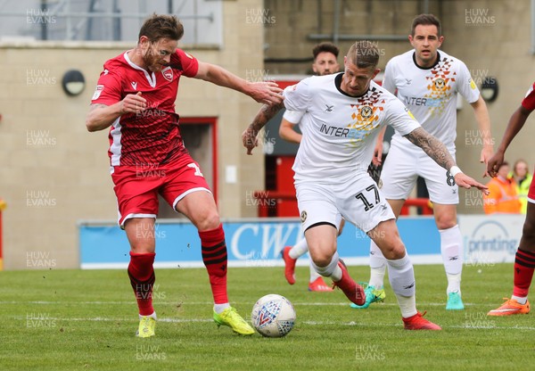 040519 - Morecambe v Newport County, Sky Bet League 2 - Scot Bennett of Newport County takes on Ritchie Sutton of Morecambe