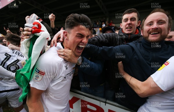 040519 - Morecambe v Newport County, Sky Bet League 2 - Regan Poole of Newport County celebrates with fans after taking the final Division 2 Play Off place