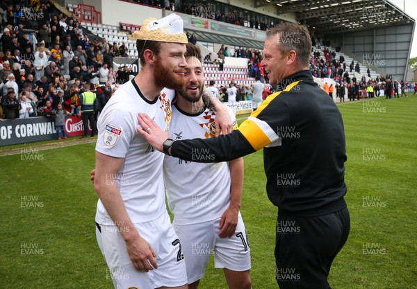 040519 - Morecambe v Newport County, Sky Bet League 2 - Mark O'Brien of Newport County, Josh Sheehan of Newport County and Newport County manager Michael Flynn celebrate after taking the final Division 2 Play Off place