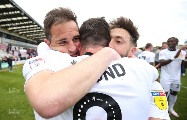 040519 - Morecambe v Newport County, Sky Bet League 2 - Matty Dolan, Padraig Amond and Josh Sheehan of Newport County celebrate after taking the final Division 2 Play Off place