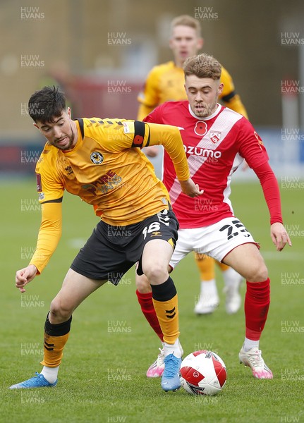 061121 - Morecambe v Newport County - FA Cup First Round - Finn Azaz of Newport County and Alfie McCalmont of Morecambe FC