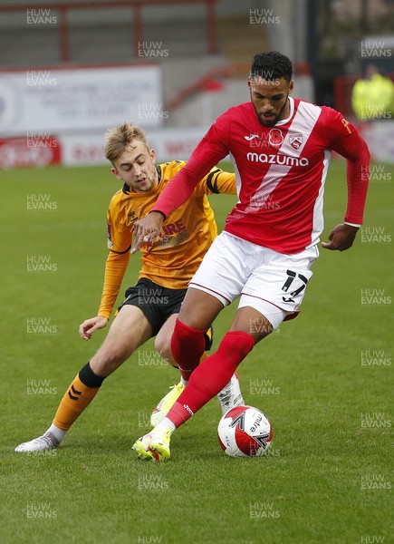 061121 - Morecambe v Newport County - FA Cup First Round - Jonah Ayunga of Morecambe FC and Jake Cain of Newport County