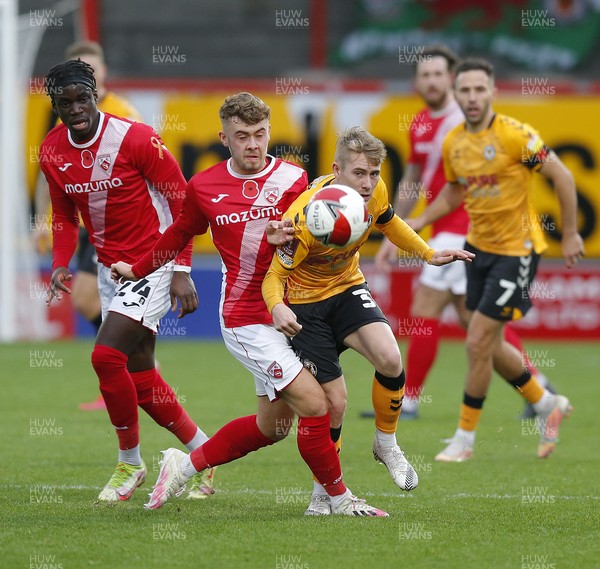061121 - Morecambe v Newport County - FA Cup First Round - Oli Cooper of Newport County and Alfie McCalmont of Morecambe FC