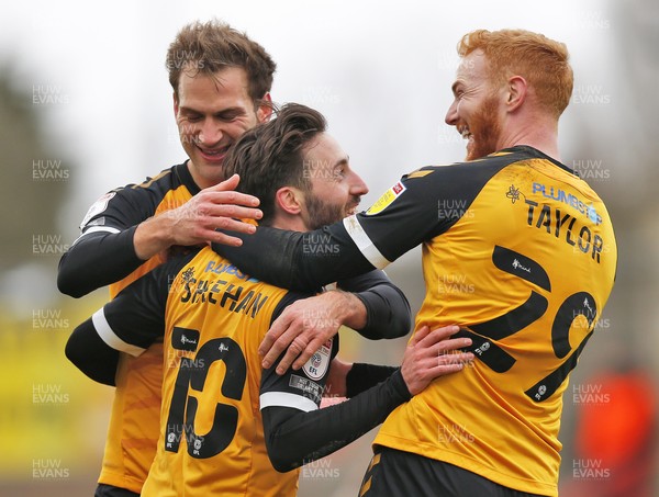 130321 - Morecambe v Newport County - Sky Bet League 2 - Josh Sheehan of Newport County celebrates scoring his team's 2nd goal with Ryan Taylor of Newport County and Mickey Demetriou of Newport County