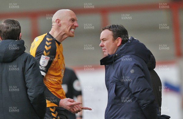 130321 - Morecambe v Newport County - Sky Bet League 2 - Kevin Ellison of Newport County scores the 3rd goal and pointedly celebrates in front of the home bench and the Manager Derek Adams of Morecambe FC [his team until he joined Newport this season]