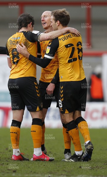 130321 - Morecambe v Newport County - Sky Bet League 2 - Kevin Ellison of Newport County celebrates scoring the 3rd goal with Matt Dolan of Newport County and Mickey Demetriou of Newport County