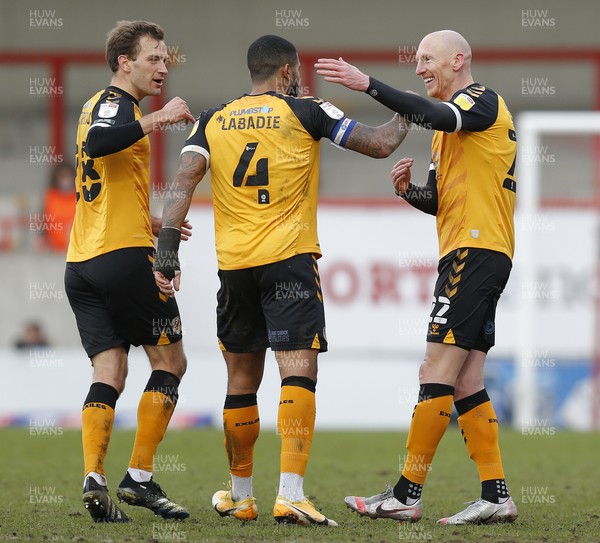 130321 - Morecambe v Newport County - Sky Bet League 2 - Kevin Ellison of Newport County celebrates scoring the 3rd goal with Joss Labadie of Newport County and Mickey Demetriou of Newport County