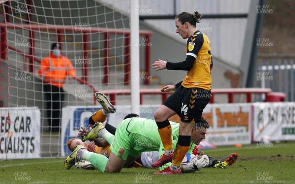 130321 - Morecambe v Newport County - Sky Bet League 2 - Ryan Taylor of Newport County and Yann Songo'o of Morecambe FC and Goalkeeper Kyle Letheren of Morecambe FC takes the ball and Aaron Lewis of Newport County can�t take advantage 