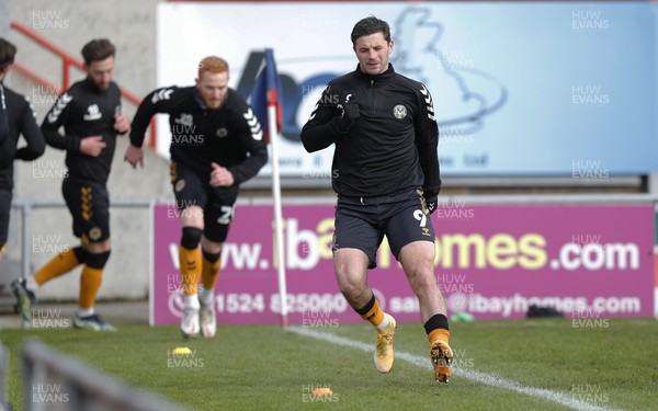 130321 - Morecambe v Newport County - Sky Bet League 2 - Prematch warm up led by Padraig Amond of Newport County