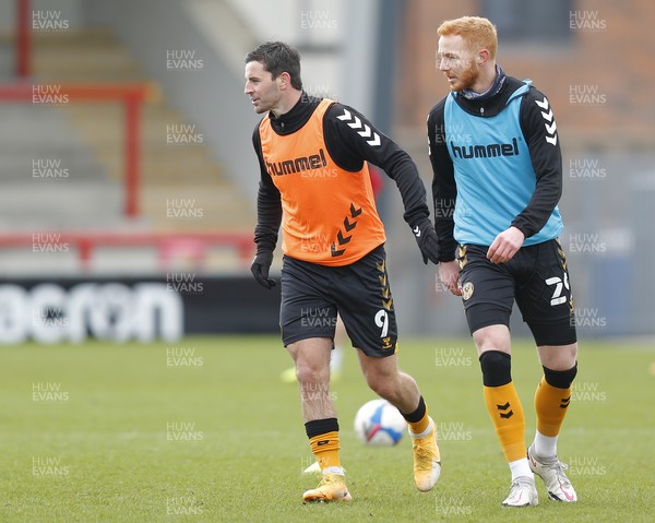 130321 - Morecambe v Newport County - Sky Bet League 2 - Padraig Amond of Newport County and Ryan Taylor in pre match warm up