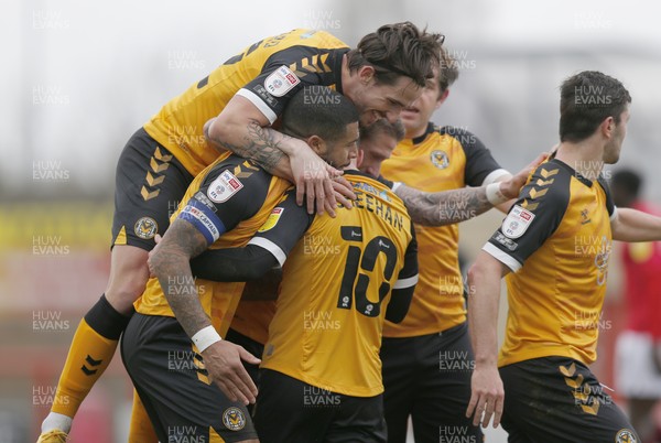 130321 - Morecambe v Newport County - Sky Bet League 2 - Josh Sheehan of Newport County celebrates scoring 2nd team goal with Ryan Taylor of Newport County and Mickey Demetriou of Newport County with Liam Shephard of Newport County on top