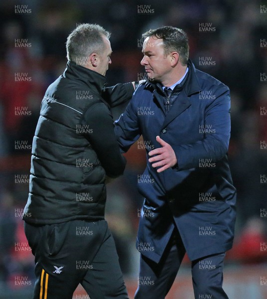 211219 - Morecambe v Newport County - Sky Bet League 2 -  Manager Mike Flynn of Newport County and Manager Derek Adams of Morecambe at the end of the match