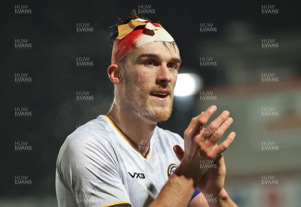 281123 - Morecambe v Newport County - Sky Bet League 2 - Ryan Delaney of Newport County with blood seeping through bandages