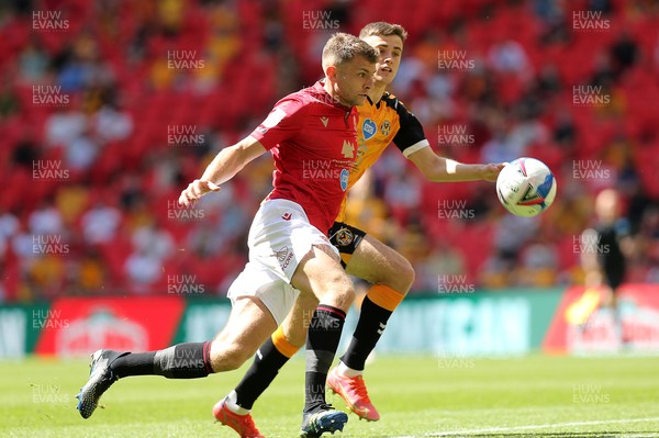 310521 - Morecambe v Newport County, SkyBet League 2 Play Off Final - Sam Lavelle of Morecambe and Lewis Collins of Newport County go for the ball