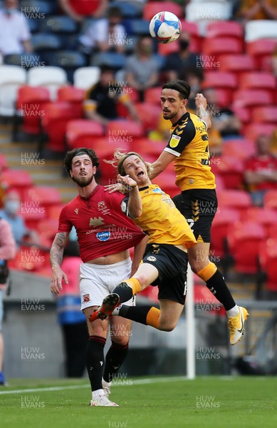 310521 - Morecambe v Newport County, SkyBet League 2 Play Off Final - Aaron Lewis of Newport County heads the ball clear