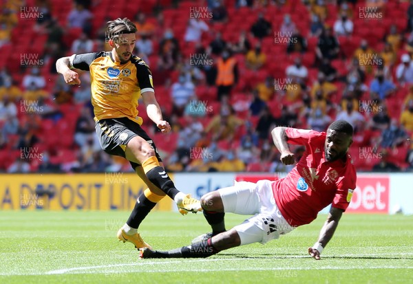 310521 - Morecambe v Newport County, SkyBet League 2 Play Off Final - Liam Shephard of Newport County takes a shot at goal as Yann Songo'o of Morecambe challenges