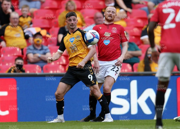 310521 - Morecambe v Newport County, SkyBet League 2 Play Off Final - Padraig Amond of Newport County is challenged by Liam Gibson of Morecambe
