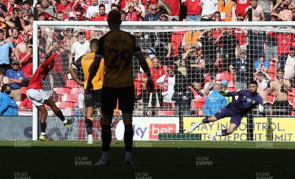 310521 - Morecambe v Newport County, SkyBet League 2 Play Off Final - Carlos Mendes Gomes of Morecambe beats Tom King of Newport County to score a penalty goal