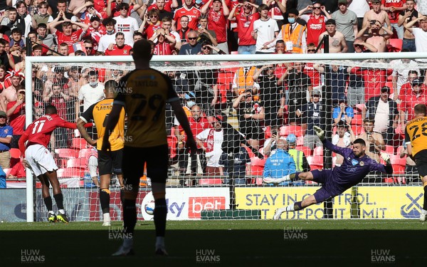310521 - Morecambe v Newport County, SkyBet League 2 Play Off Final - Carlos Mendes Gomes of Morecambe beats Tom King of Newport County to score a penalty goal