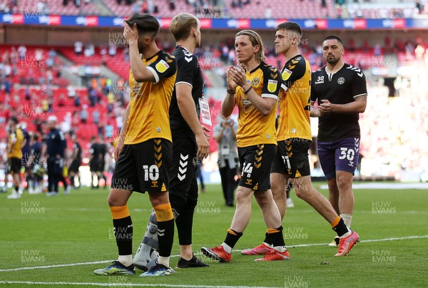 310521 - Morecambe v Newport County, SkyBet League 2 Play Off Final - Dejected Josh Sheehan, Aaron Lewis and Lewis Collins of Newport County