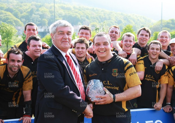 30.04.11 Mountain Ash v Penallta - Swalec League - Mountain Ash's Craig Evans receives the Division 2 East trophy from WRU's Humphrey  Evans. 