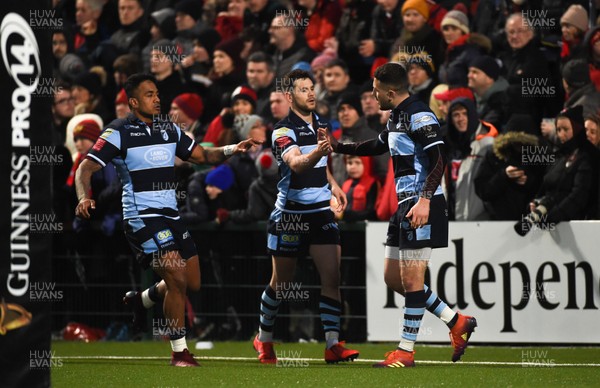 050419 - Munster v Cardiff Blues - Guinness PRO14 -  Aled Summerhill of Cardiff Blues, right, celebrates with team-mates Rey Lee-Lo, left, and Tomos Williams after scoring his side's second try