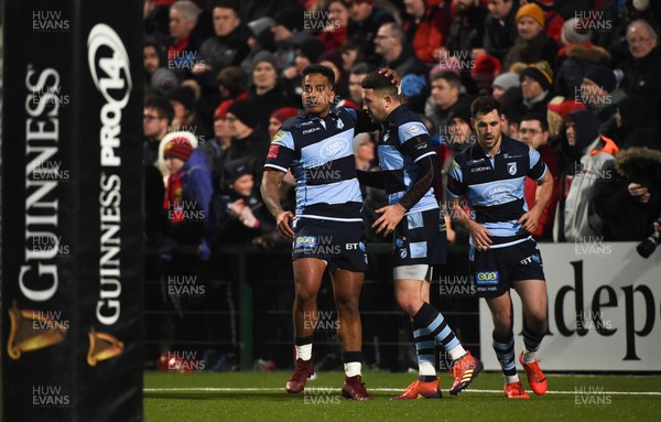 050419 - Munster v Cardiff Blues - Guinness PRO14 -  Aled Summerhill of Cardiff Blues, centre, celebrates with team-mates Rey Lee-Lo, left, and Tomos Williams after scoring his side's second try 