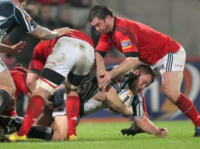 RaboDirect PRO12, Thomond Park, Limerick 24/2/2012Munster vs Cardiff Blues Scott Andrews of Cardiff tackled by Damien Varley of MunsterMandatory Credit 