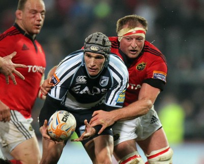 RaboDirect PRO12, Thomond Park, Limerick 24/2/2012Munster vs Cardiff Blues Tom James of Cardiff tackled by Mick O'Driscoll of MunsterMandatory Credit 