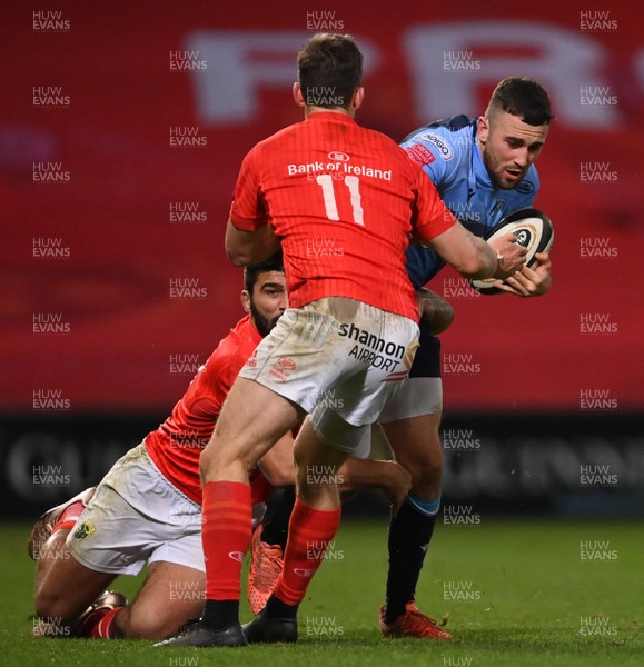 261020 - Munster v Cardiff Blues - Guinness PRO14 - Aled Summerhill of Cardiff Blues is tackled by Damian de Allende, left, and Darren Sweetnam of Munster
