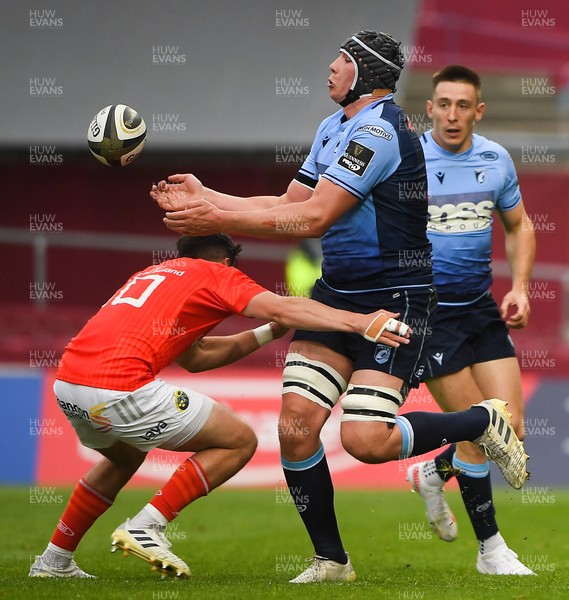 280521 - Munster v Cardiff Blues - Guinness PRO14 Rainbow Cup - Seb Davies of Cardiff Blues is tackled by Joey Carbery of Munster