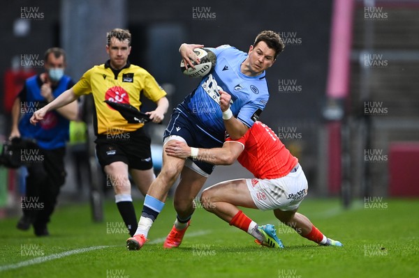 280521 - Munster v Cardiff Blues - Guinness PRO14 Rainbow Cup - Jason Harries of Cardiff Blues is tackled by Shane Daly of Munster