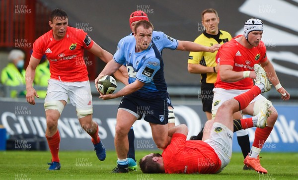 280521 - Munster v Cardiff Blues - Guinness PRO14 Rainbow Cup - Kristian Dacey of Cardiff Blues is tackled by James Cronin of Munster