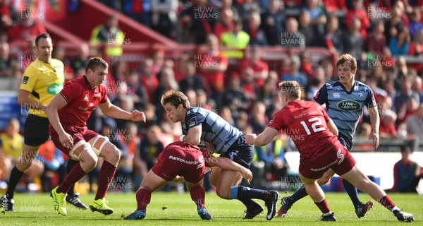 300917 Munster v Cardiff Blues - Blaine Scully of Cardiff Blues is tackled by Ian Keatley of Munster
