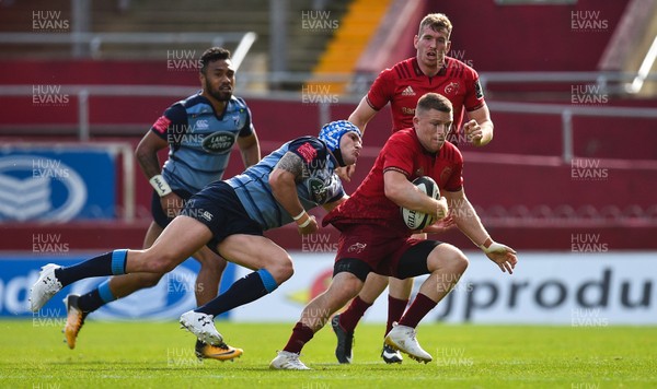 300917 Munster v Cardiff Blues - Andrew Conway of Munster is tackled by Tom James of Cardiff Blues