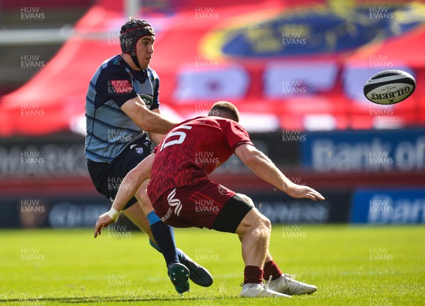 300917 Munster v Cardiff Blues - Rhun Williams of Cardiff Blues in action against Andrew Conway of Munster