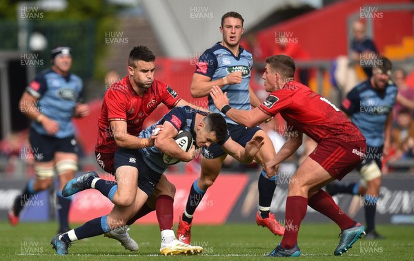 300917 Munster v Cardiff Blues - Tomos Williams of Cardiff Blues is tackled by Conor Murray, left, and Ian Keatley of Munster