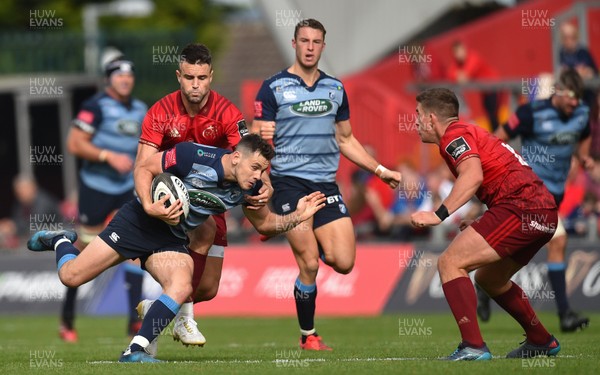 300917 Munster v Cardiff Blues - Tomos Williams of Cardiff Blues is tackled by Conor Murray of Munster