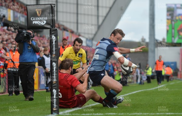 300917 Munster v Cardiff Blues -  Blaine Scully of Cardiff Blues is tackled by Rhys Marshall of Munster 