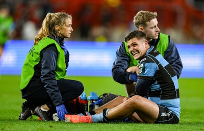 041025 - Munster v Cardiff Rugby, United Rugby Championship - Callum Sheedy of Cardiff Rugby receives medical attention during the United Rugby Championship match between Munster and Cardiff Rugby