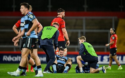 041025 - Munster v Cardiff Rugby, United Rugby Championship - Harri Millard of Cardiff Rugby receives medical attention 
