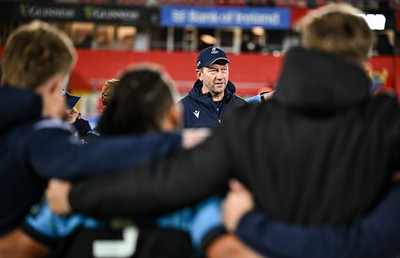 041025 - Munster v Cardiff Rugby, United Rugby Championship - Cardiff Rugby head coach Corniel van Zyl speaks to players after their side's defeat in the United Rugby Championship against Munster