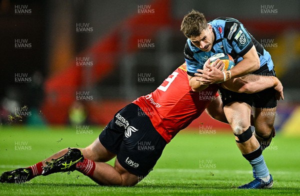 041025 - Munster v Cardiff Rugby, United Rugby Championship - Harri Millard of Cardiff Rugby is tackled by Oli Jager of Munster