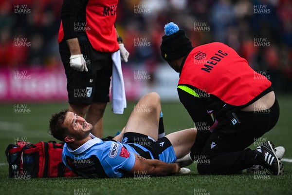 290422 - Munster v Cardiff Rugby - United Rugby Championship - Hallam Amos of Cardiff Blues receives treatment after picking up an injury