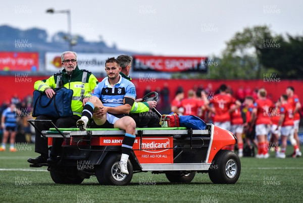 290422 - Munster v Cardiff Rugby - United Rugby Championship - Hallam Amos of Cardiff Blues leaves the field on a medical cart after picking up an injury