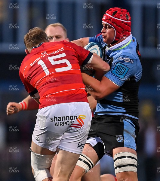 290422 - Munster v Cardiff Rugby - United Rugby Championship - James Botham of Cardiff is tackled by Mike Haley of Munster