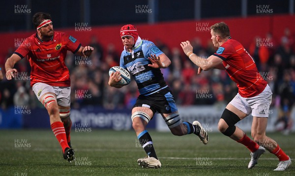 290422 - Munster v Cardiff Rugby - United Rugby Championship - James Botham of Cardiff is tackled by Jean Kleyn